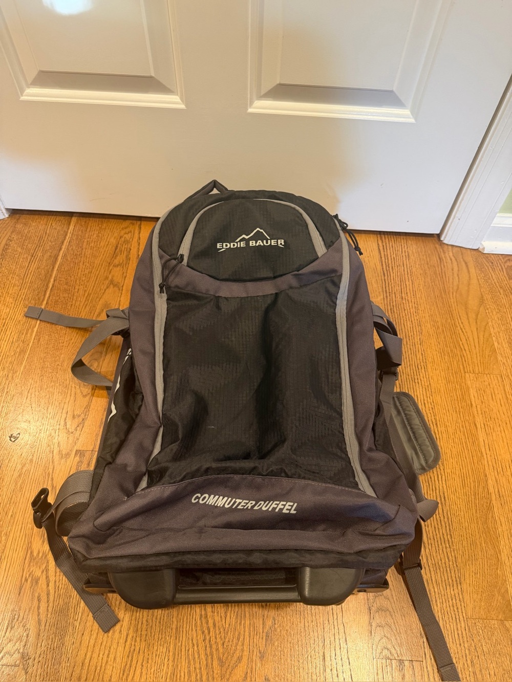 Eddie Bauer Black Rolling Commuter Duffle Bag Carry On Luggage 22" x 12”